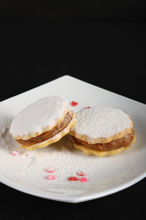 Alfajores de maicena rellenos de pistacho